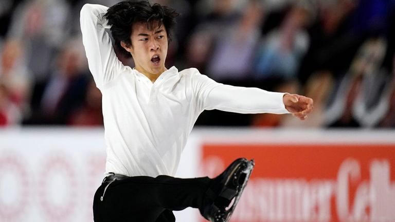 Four-time champ Chen wins short program with ease