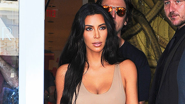 Kim Kardashian Slays In Low-Cut Bodysuit & Sexy Lace-Up Heels In New SKIMS Campaign