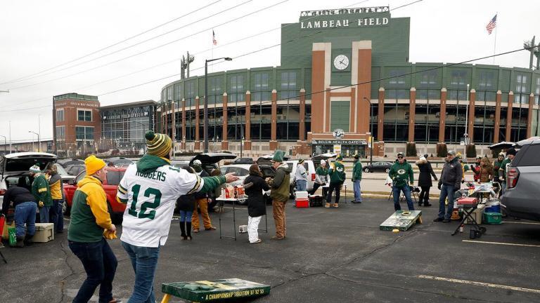 Packers fans raise eyebrows with COVID flag at Lambeau Field
