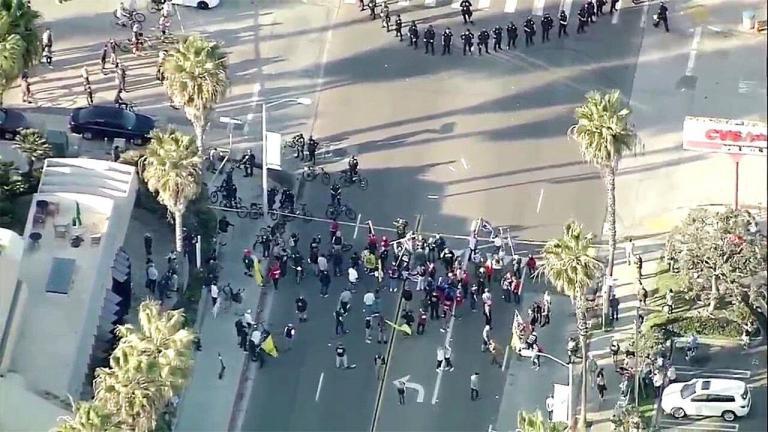 San Diego police declare ‘unlawful assembly’ as Trump supporters, counter-protesters face off
