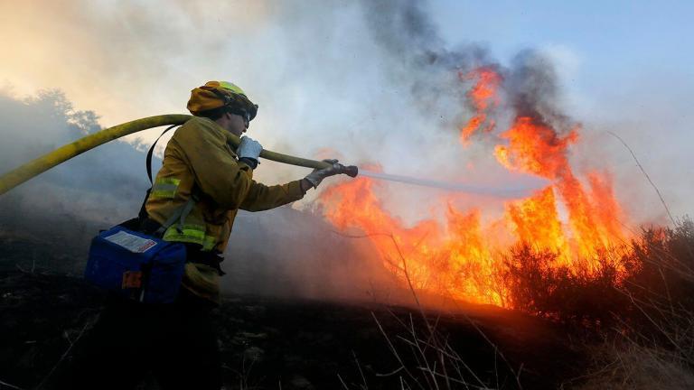 Southern California wildfire fanned by hot, dry and windy weather