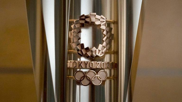 Spreading virus pulls Olympic torches off display in Japan
