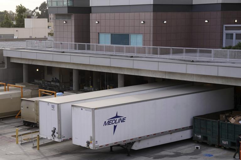 Temporary Morgue Erected In L.A. Parking Lot Uses 10 Tractor Trailers To Deal With Overflow Due To Record Covid-19 Deaths