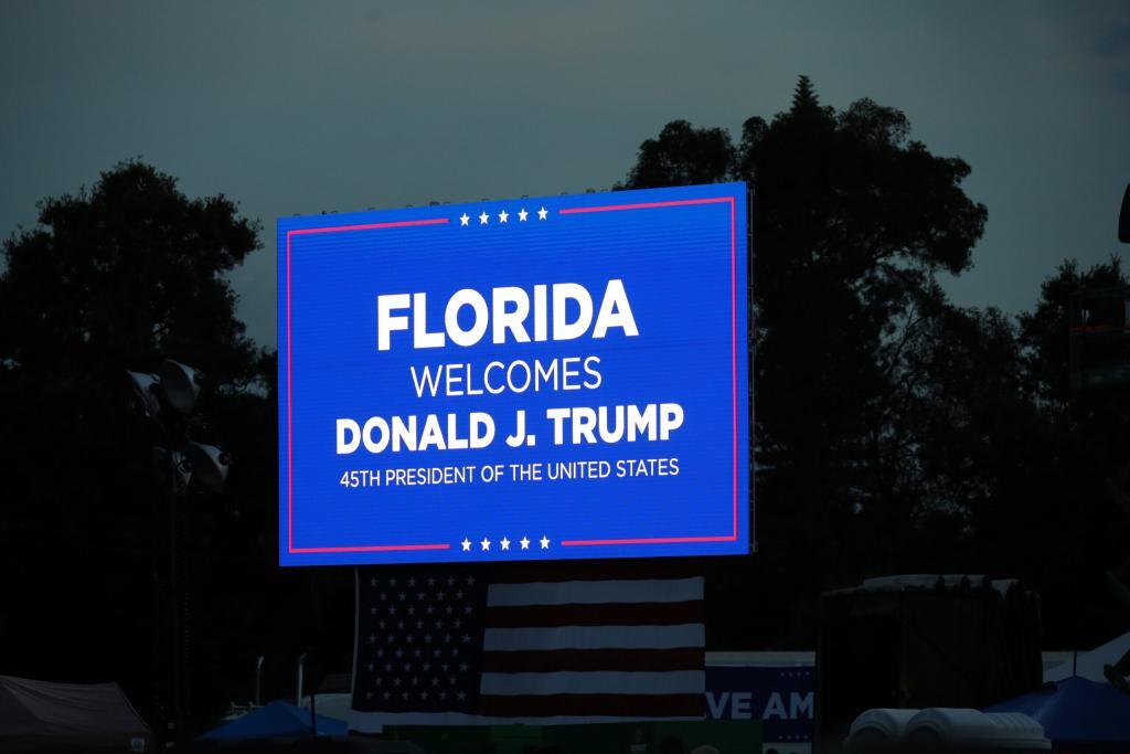 The welcome sign for Donald Trump at the fairgrounds.