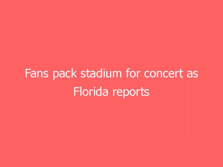 Fans pack stadium for concert as Florida reports tens of thousands of new COVID-19 cases